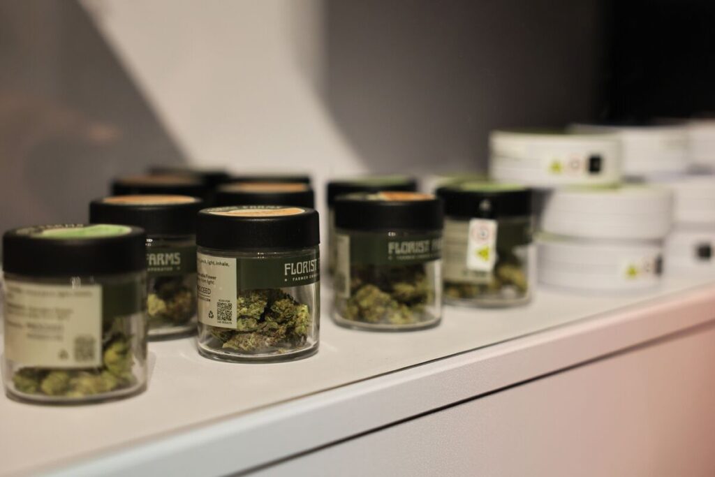 Cannabis products including flower, edibles, pre-rolls, and vape cartridges displayed inside a licensed Washington DC dispensary.